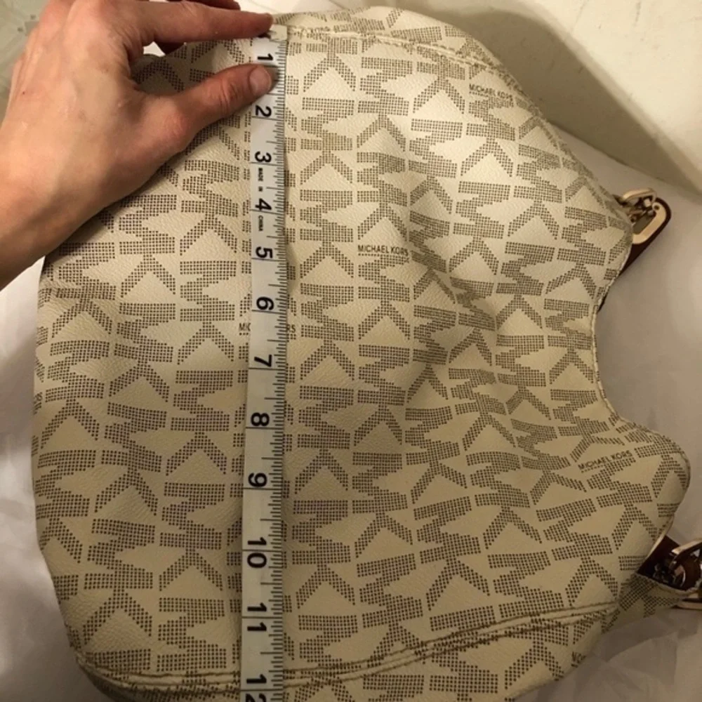 Michael kors white monogram triple compartment bag